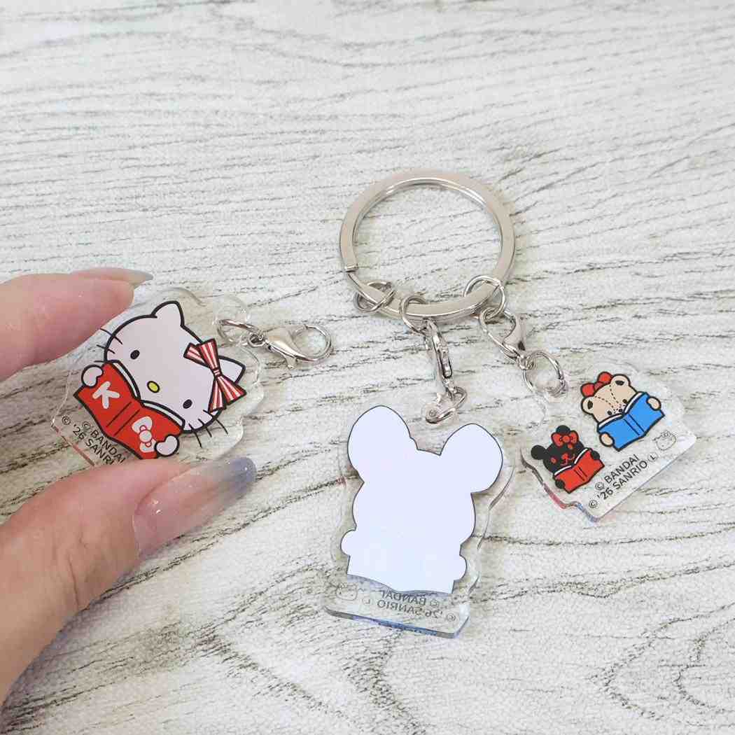 くまのがっこうxハローキティ ミニポーチ 3連アクリルキーホルダー どくしょ サンリオ バンダイ