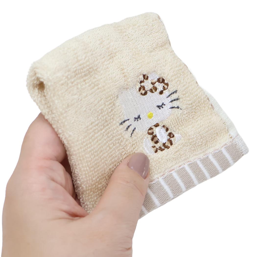 巾着入りタオルハンカチ ミニタオル ハローキティ ヒョウ サンリオ カミオジャパン プレゼント メール便可